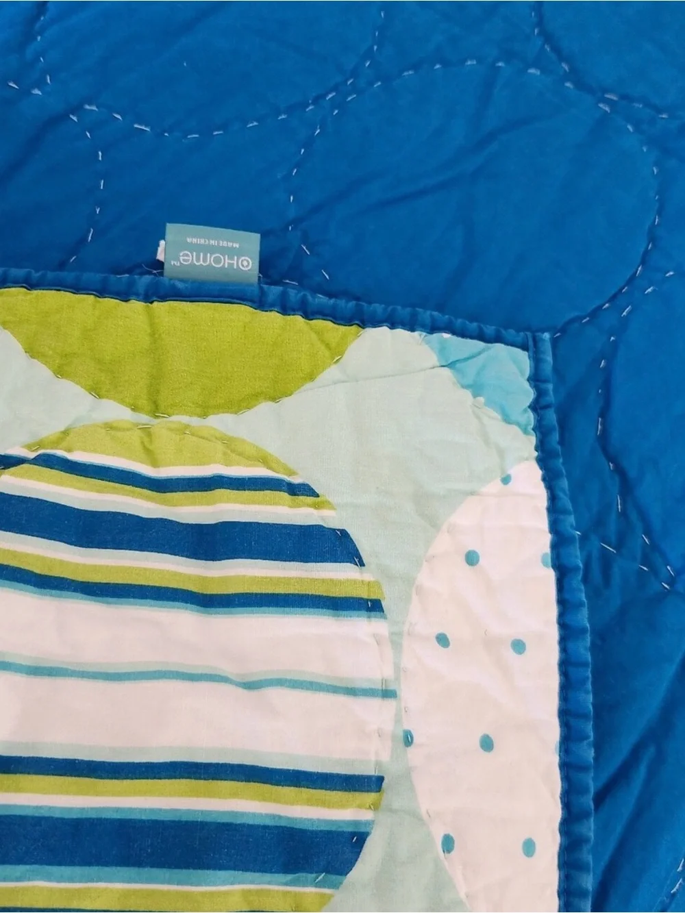 Circo Polka Dot Quilt in Blue, Green, and Cream